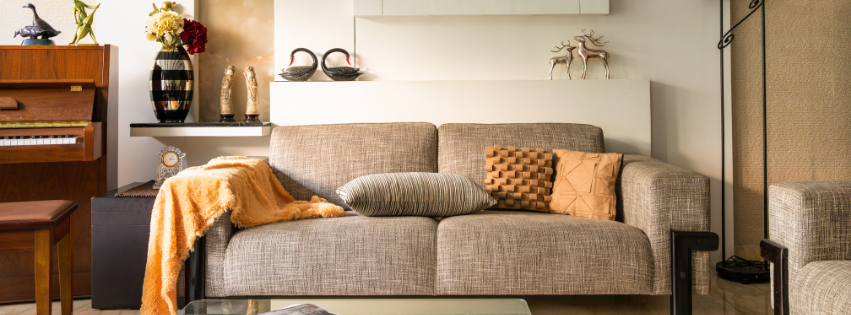 throw and pillows on sofa