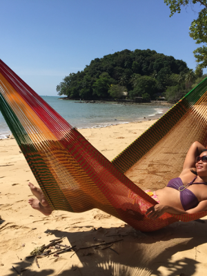 tiyainhammock a girl in bikini in a hammock